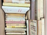 a box full of books sitting on a table