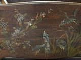 a wooden box with a painting of birds and flowers on it
