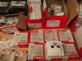 many different types of electrical equipment on a table