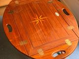 a wooden table with a star design on top of it