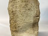 an image of a stone sculpture of a head on a white surface