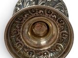 an antique brass door knob on a white background with a white background