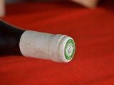 a bottle of wine that is sitting on a table