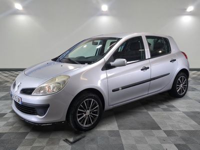 a picture of a silver car on a checkered floor