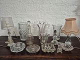 a table with a lot of glass items on it