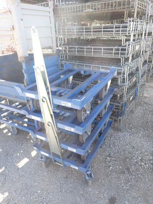 a pile of metal crates stacked on top of each other