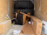 a van that has a lot of boxes in the back of it