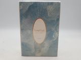 an image of a box of perfume sitting on a white surface