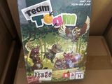 a box with a game on it sitting on a cardboard box