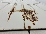 a rust on the side of an airplane ' s wing