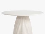 a white table with a white base and a white table top