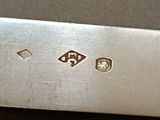 a close up of a knife on a table