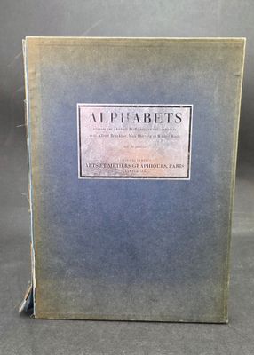 an old book with a label on it sitting on a table