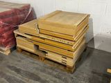 a pile of wooden pallets in a warehouse
