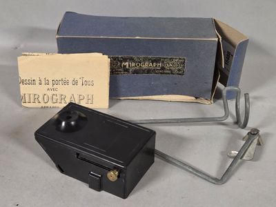 a small box with a metal handle and a small box with a metal handle