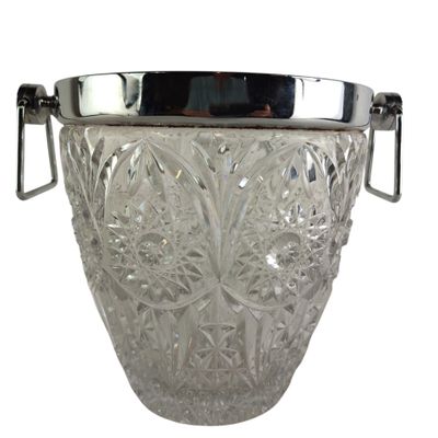 a glass ice bucket with a metal handle on a white background