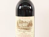 bottle of red wine with a red cap and a white background
