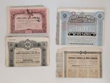four different types of old currency are displayed on a white surface