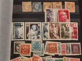 several different types of stamps are on display in a display case