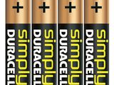four piles of batteries with the words duracel on them