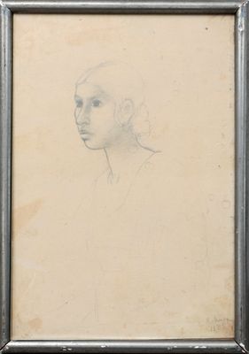 drawing of a woman ' s face in a silver frame