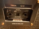 a close up of the back panel of a speaker with a label on it
