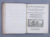 an open book with a picture of a man riding a horse on it