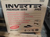 a box of inverter batteries sitting on top of a wooden pallet