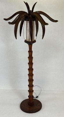 Aldo TURA (1909-1963) Lampadaire en bois sculpté figurant un…