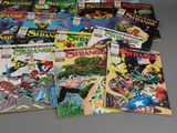 a lot of comic books sitting on a table