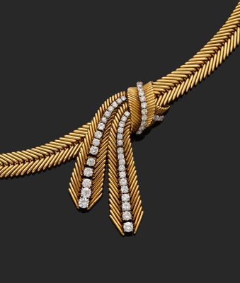 un collier en or et diamants, signé Cartier