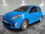 a picture of a bright blue car parked in a garage