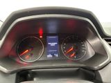 the dashboard of a car with a digital display on it