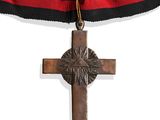 médaille avec une croix et un ruban sur fond blanc, accompagnée d'un ruban rouge et noir