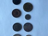 a lot of coins that are on the table