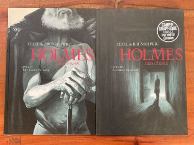 Deux livres posés sur une table en bois : l'un représente un homme et l'autre une femme.