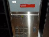 an image of a stainless steel ice maker in a kitchen