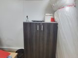 an image of a room with a bed and a desk