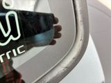 a close up of a parking meter with a sign on it