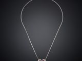a necklace with a heart shaped pendant on a chain