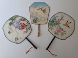 three hand painted chinese fans with birds and flowers on them