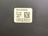 a close up of a sticker on the back of a laptop