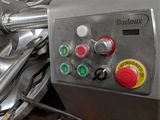 a machine that is sitting on a wooden table