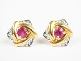 une paire de boucles d'oreilles en rubis et diamants