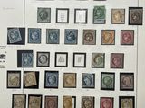 a lot of stamps on a sheet of paper on a table