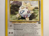 a close up of a pokemon card on a table