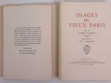 an open book with a picture of a face on the cover