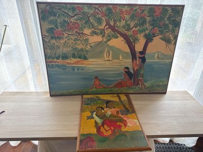 a picture of a painting on a table next to a chair