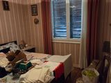 a bedroom with a bed and a window in it