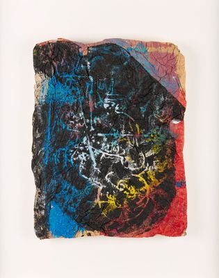 an image of a piece of art that is on a white surface